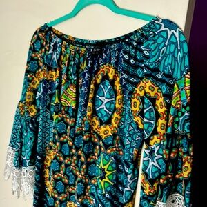 Great top or short dress made of polyester and spandex